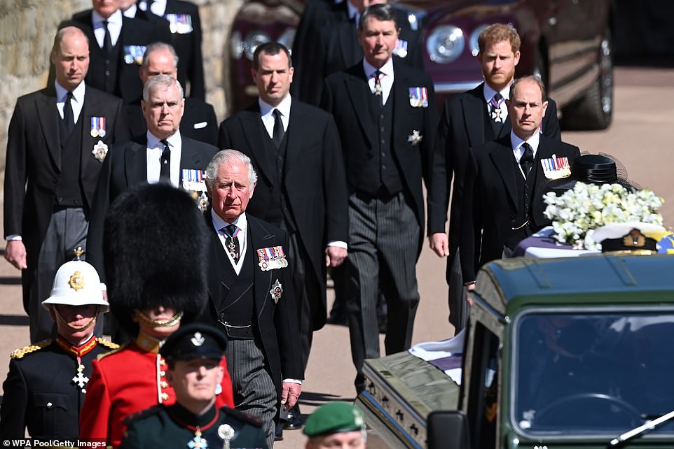 Prince Charles, Prince of Wales walks behind The Duke of Edinburgh's coffin, covered with His Royal Highness's Personal Standard, during the Ceremonial Procession during the funeral of Prince Philip